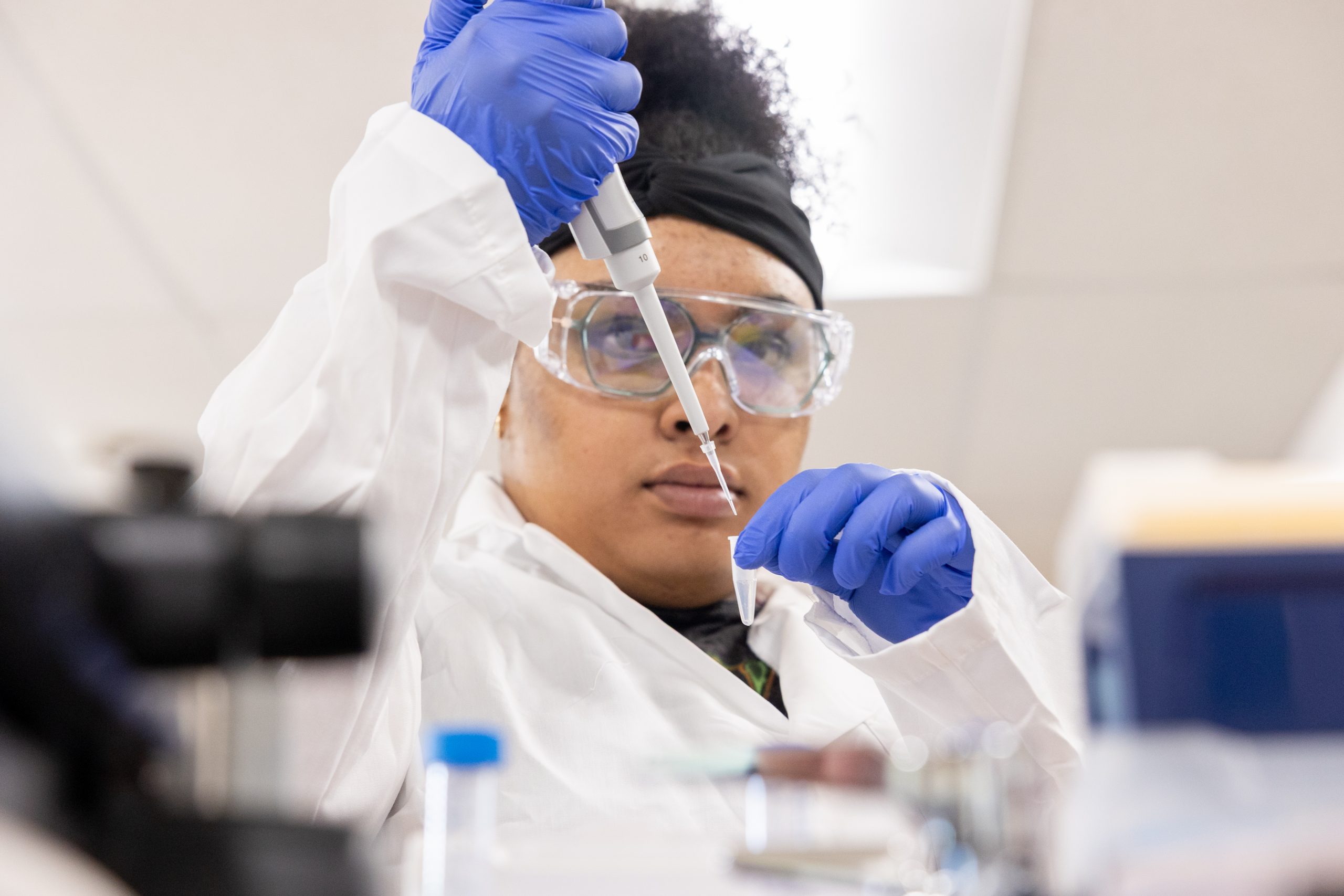Queer Science Conference attendee Milahni Lawrence uses a pipette to move microliters of liquid in Atwater Building on Sunday, June 8, 2025. (Sydney Herdle/UConn Photo)
