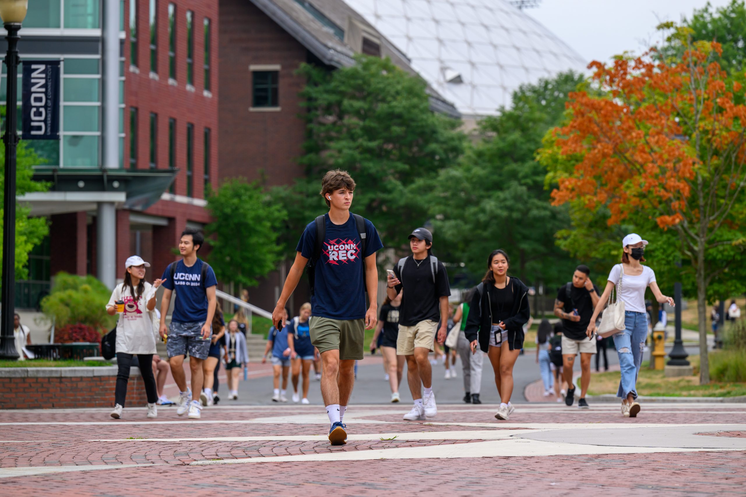 Students walk along Fairfield Way before 9 a.m. classes on Aug.29, 2022, the first day of classes. (Peter Morenus/UConn Photo)