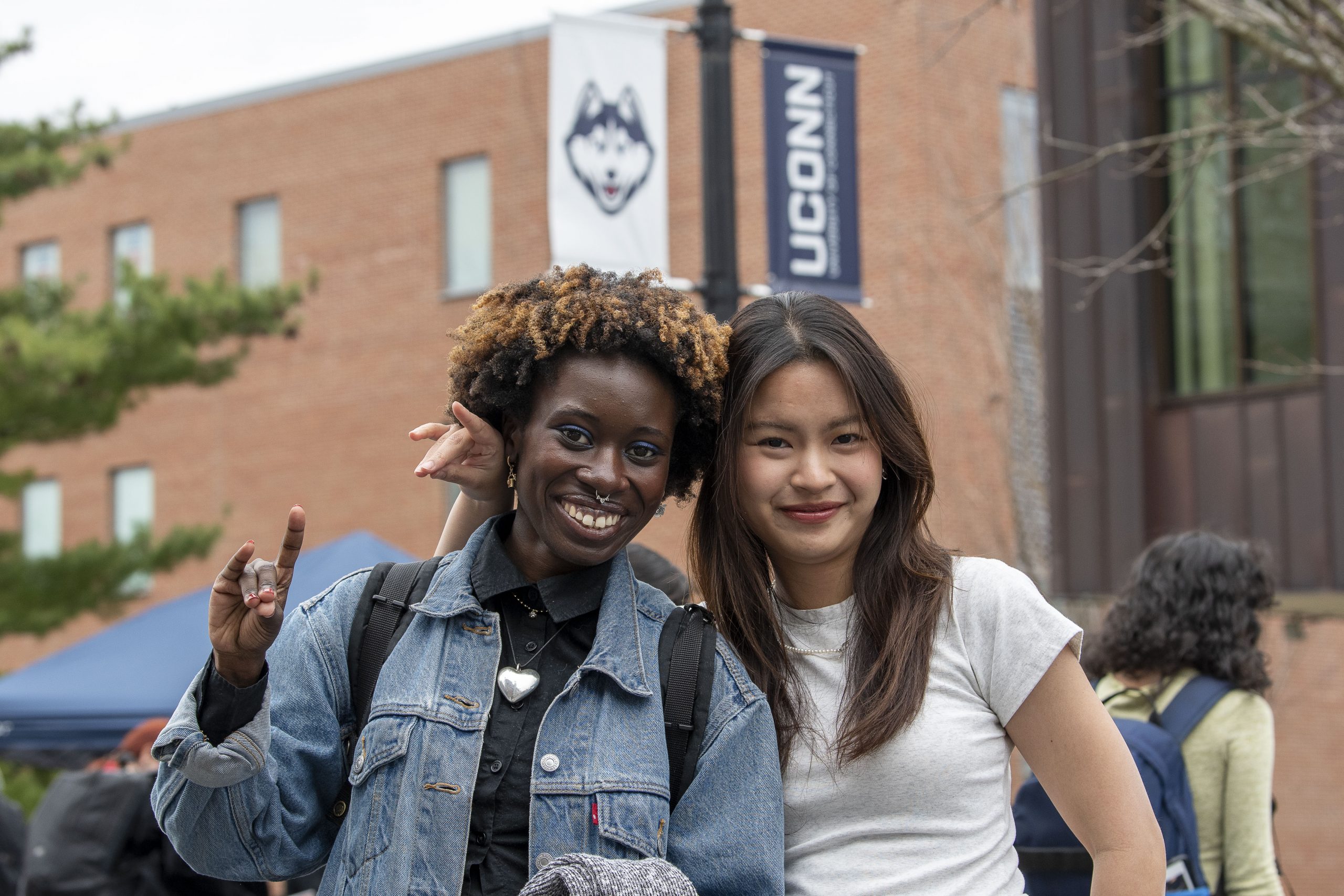 Students celebrating Earth Day along Fairfield Way during spring along Fairfield Way on April 17, 2024. (Sean Flynn/UConn Photo)