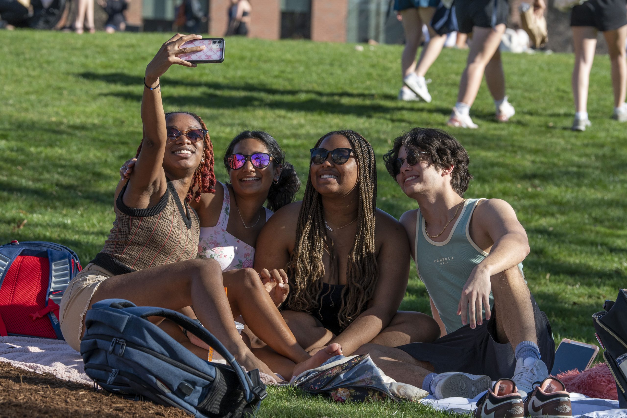 Students enjoying the great spring weather on April 13, 2023. (Sean Flynn/UConn Photo)
