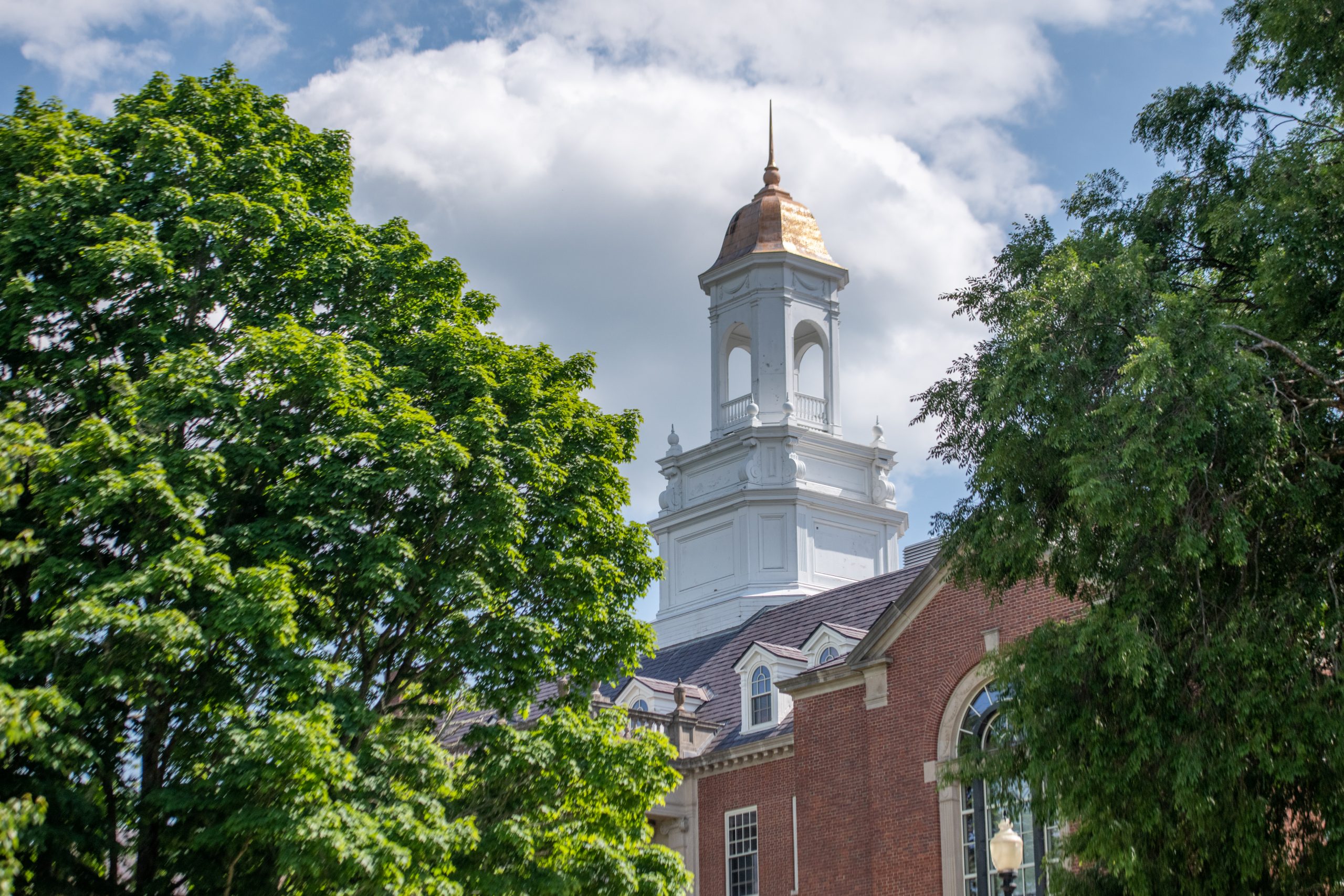 The bell tower of Wilbur Cross Building on a sunny day on June 15, 2022. (Sydney Herdle/UConn Photo)