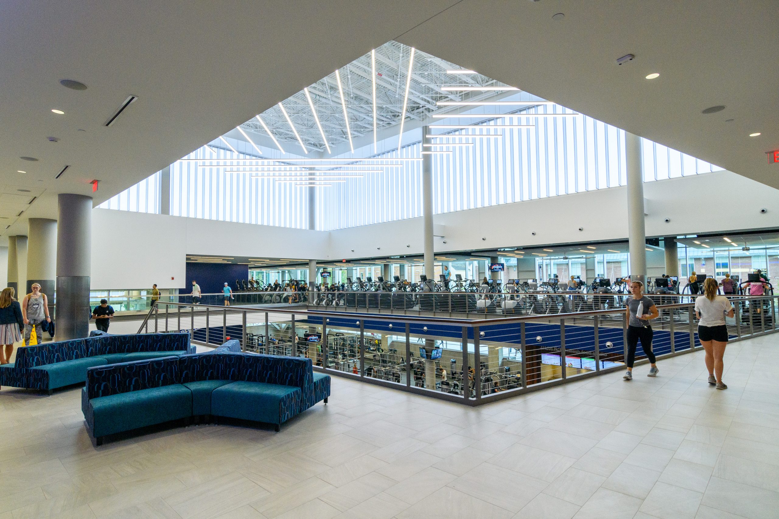 Students exercise at the new Student Recreation Center on Sept. 12, 2019. (Lucas Voghell/UConn Photo)