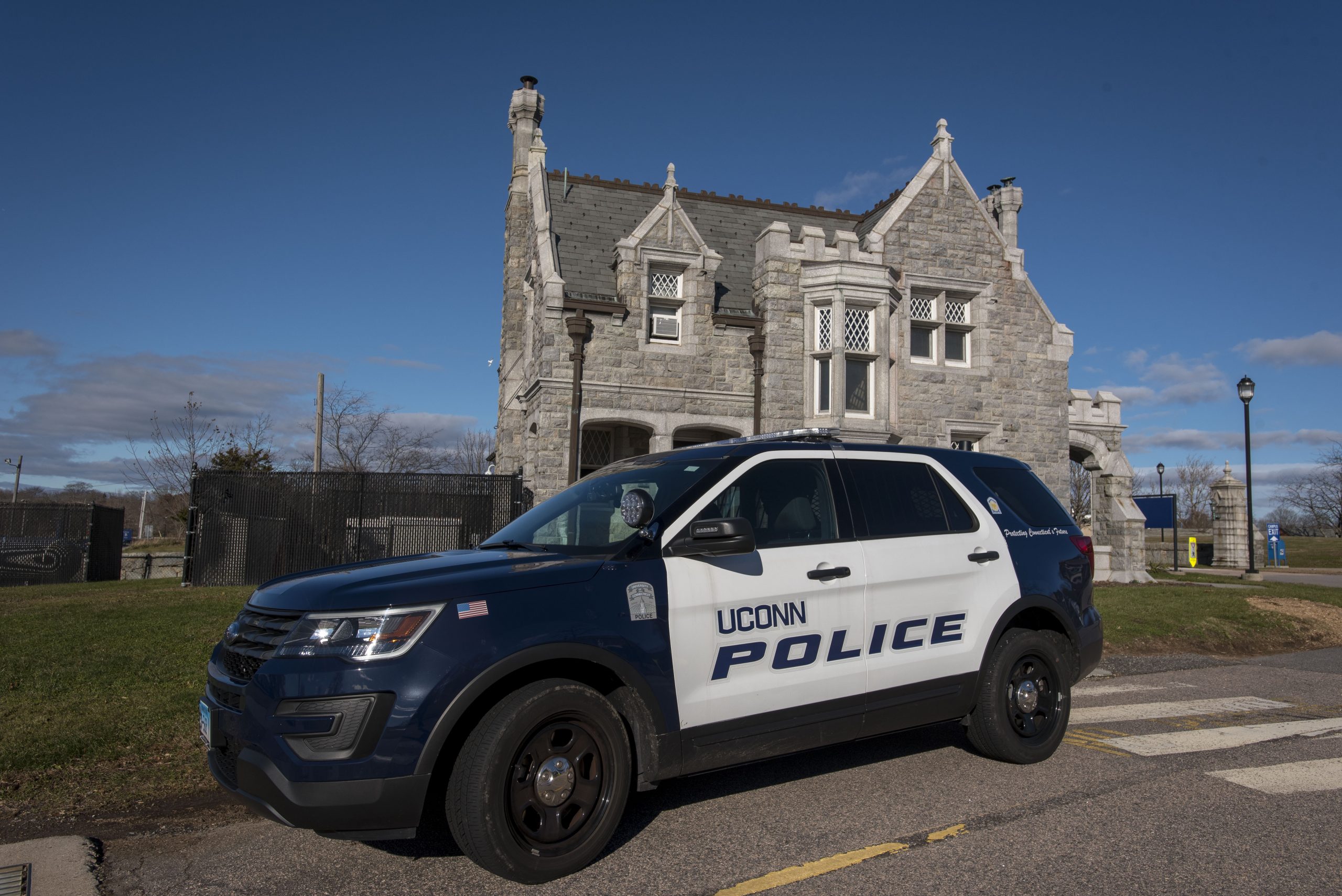 UConn police car and building at Avery Point on Nov. 29, 2018. (Sean Flynn/UConn Photo)