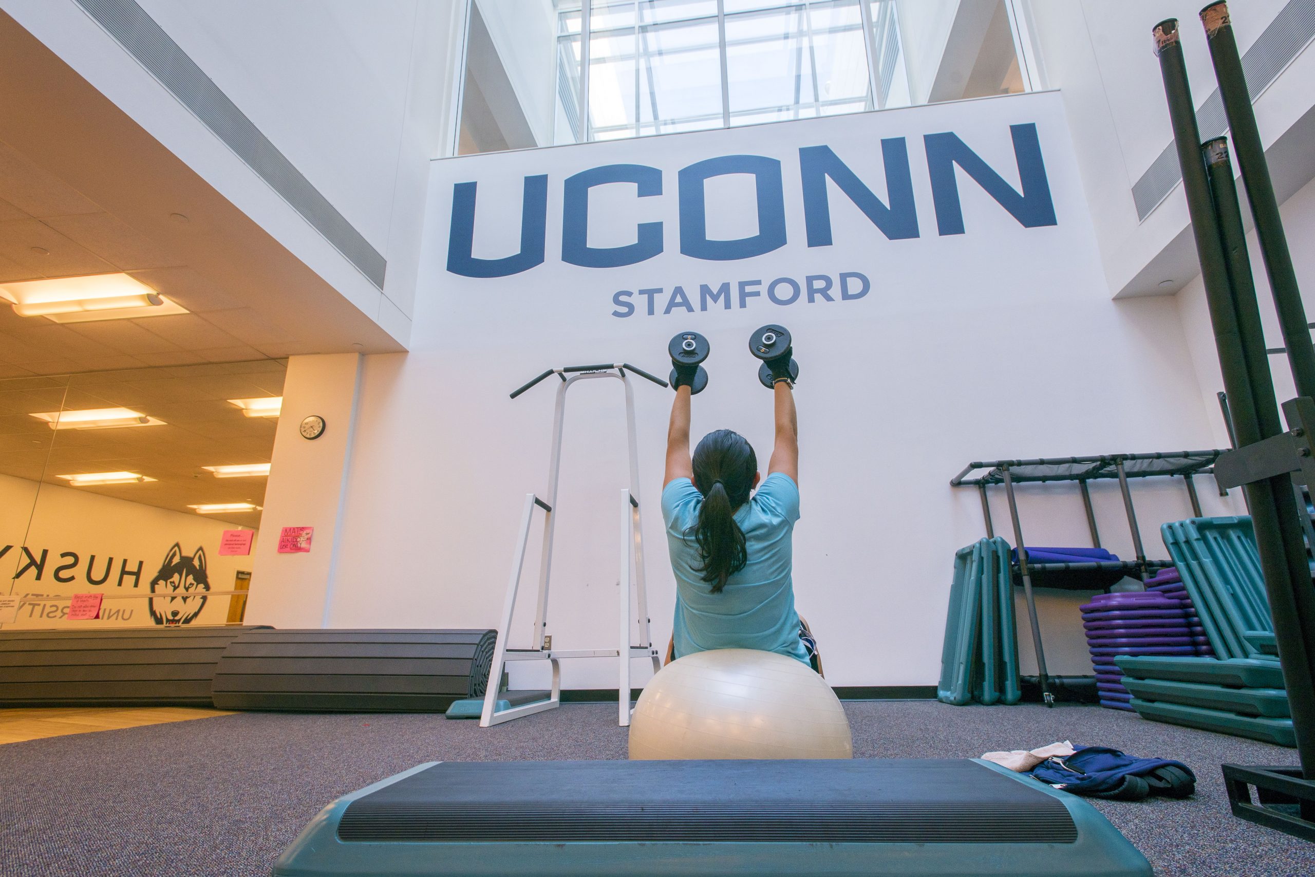 fitness-center181009c244.jpg Student exercising (workout) in the gym at UConn Stamford on Oct. 9, 2018. (Sean Flynn/UConn Photo)