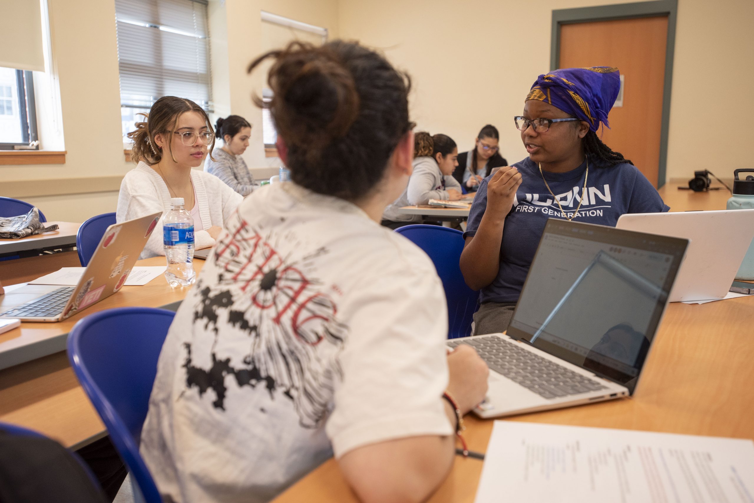 waterbury-class-240410a0034.jpg Students working on a group project in the classroom at UConn Waterbury on April 10, 2024. (Sean Flynn/UConn Photo)
