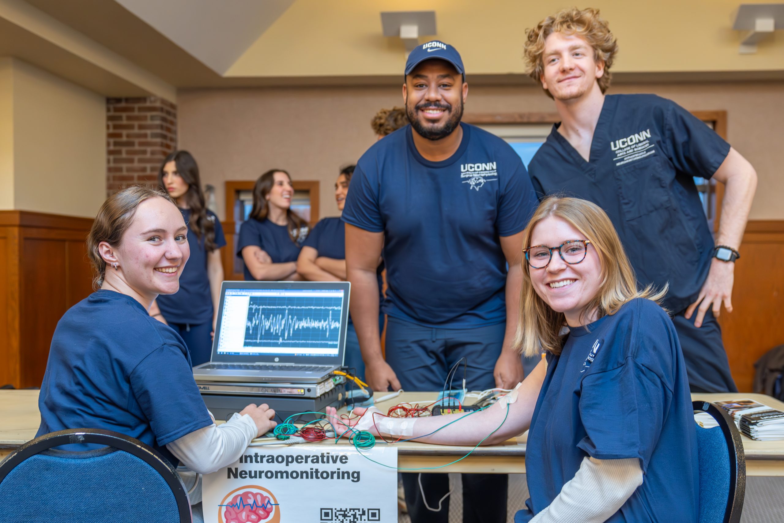 The Department of Allied Health Sciences (AHS) in the College of Agriculture, Health and Natural Resources (CAHNR) held a healthcare simulation event to provide students with opportunities to learn to use different kinds of medical equipment and to network with faculty, alumni, and peers. More than 100 students attended the event, which was held in the Rome Commons Ballroom (ROME). Nov. 12, 2024. (Milton Levin/UConn Photo)