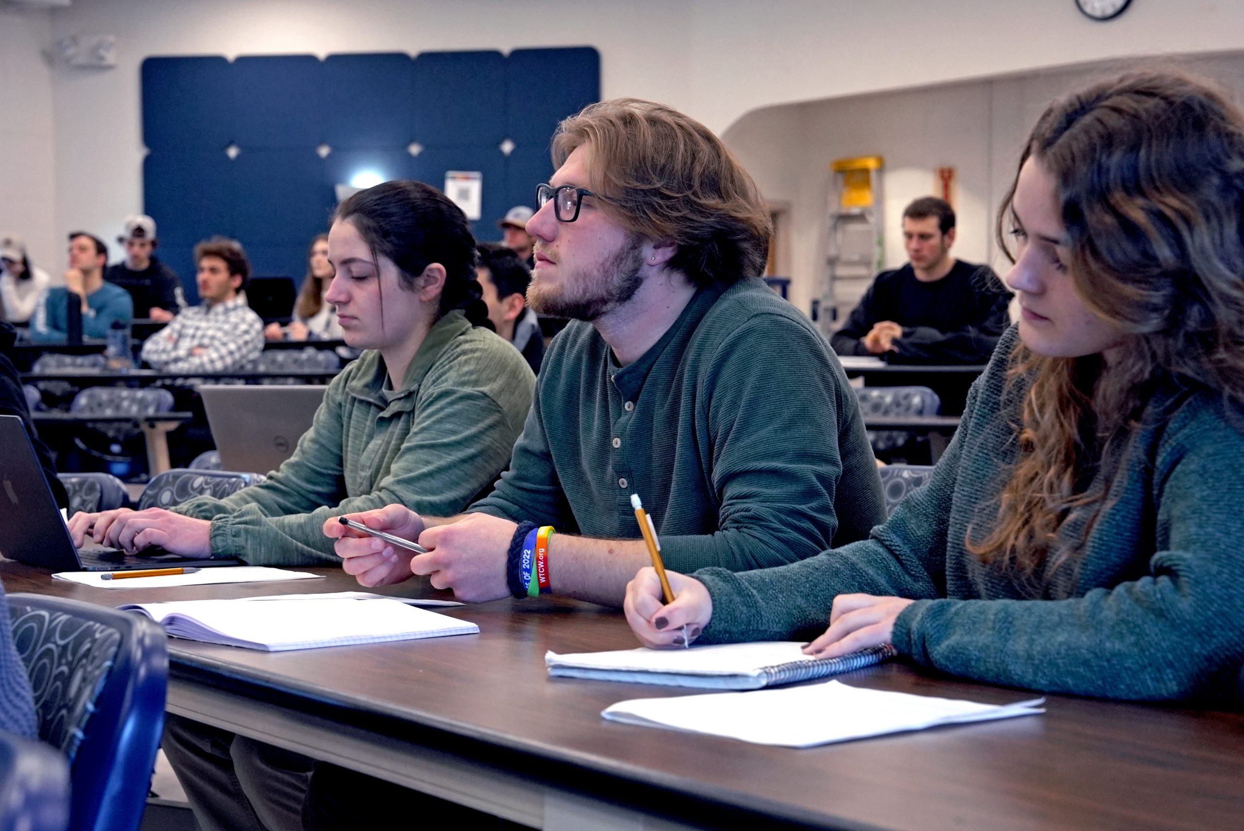 Students in Wetlands Biology and Conservation (NRE 3105), taught by Beth Lawrence of the Department of Natural Resources and the Environment (NRE) in the College of Agriculture, Health and Natural Resources (CAHNR), listen to a lecture and work on a group activity in the Wilfred B. Young Building (YNG). Feb. 26, 2025. (Jason Sheldon/UConn Photo)